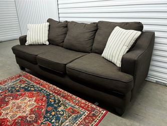 Levon Charcoal Sofa By Signature By Ashley With Matching Pillows Including Delivery