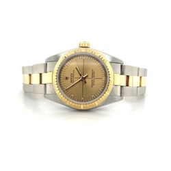Rolex Oyster Perpetual 26mm 🤙🏾❤️ Pre-owned Rolex Oyster Perpetual. The watch is two-tone, 18K gold and stainless steel. Case measures 26mm, oyster s