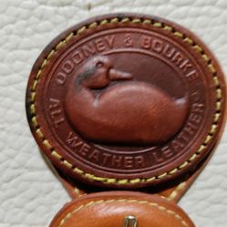 Dooney & Bourke Creme And Tan Pebbled  All Weather Leather Purse 