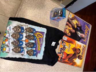 Los Angeles Lakers Kobe Bryant, Shaquille O’Neal magazines, T-shirt, and a watch
