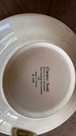 4,  four place settings of Classic Gold fine china