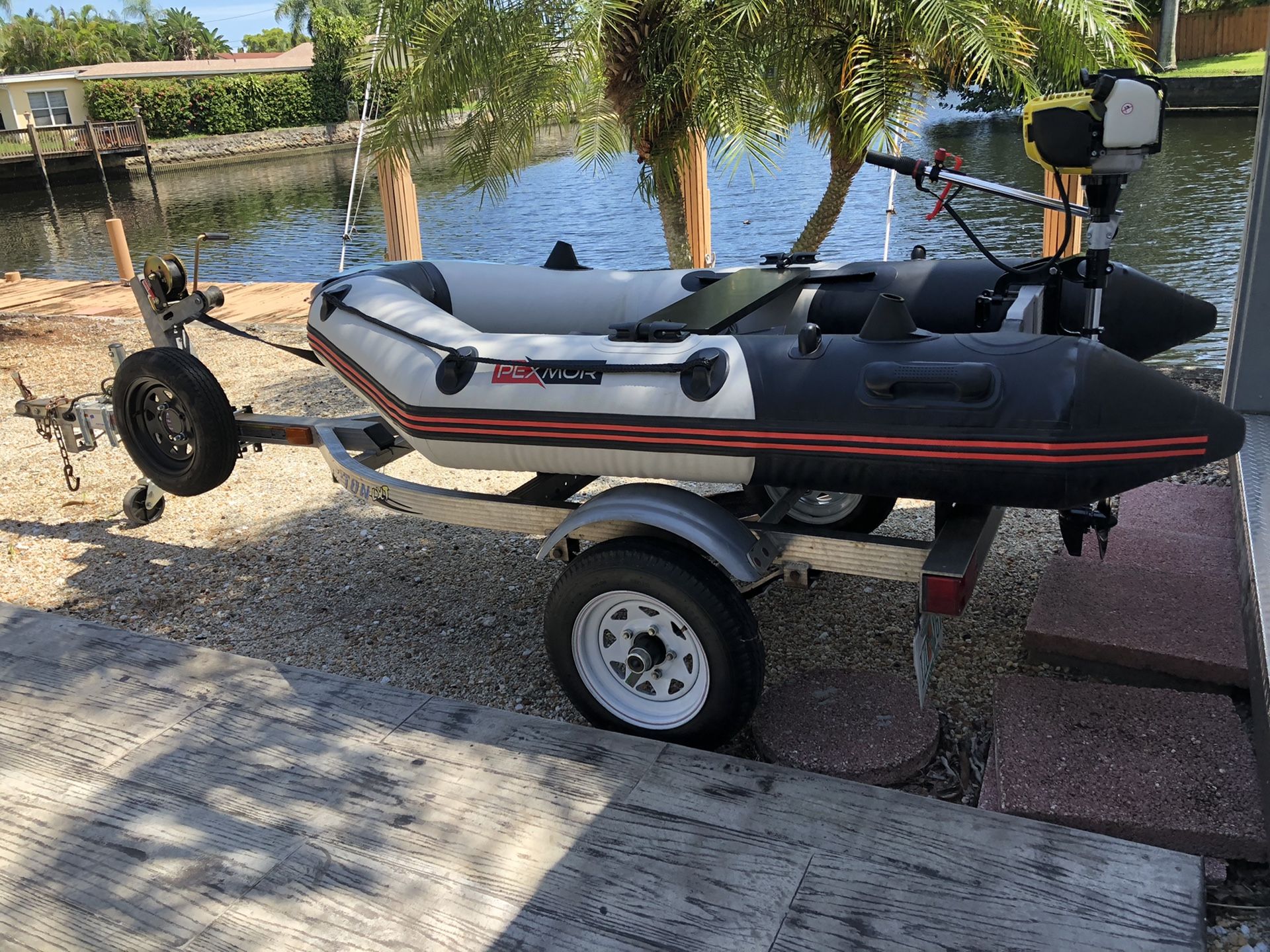 Like New Inflatable Boat Dinghy 4 Stroke motor with aluminum trailer