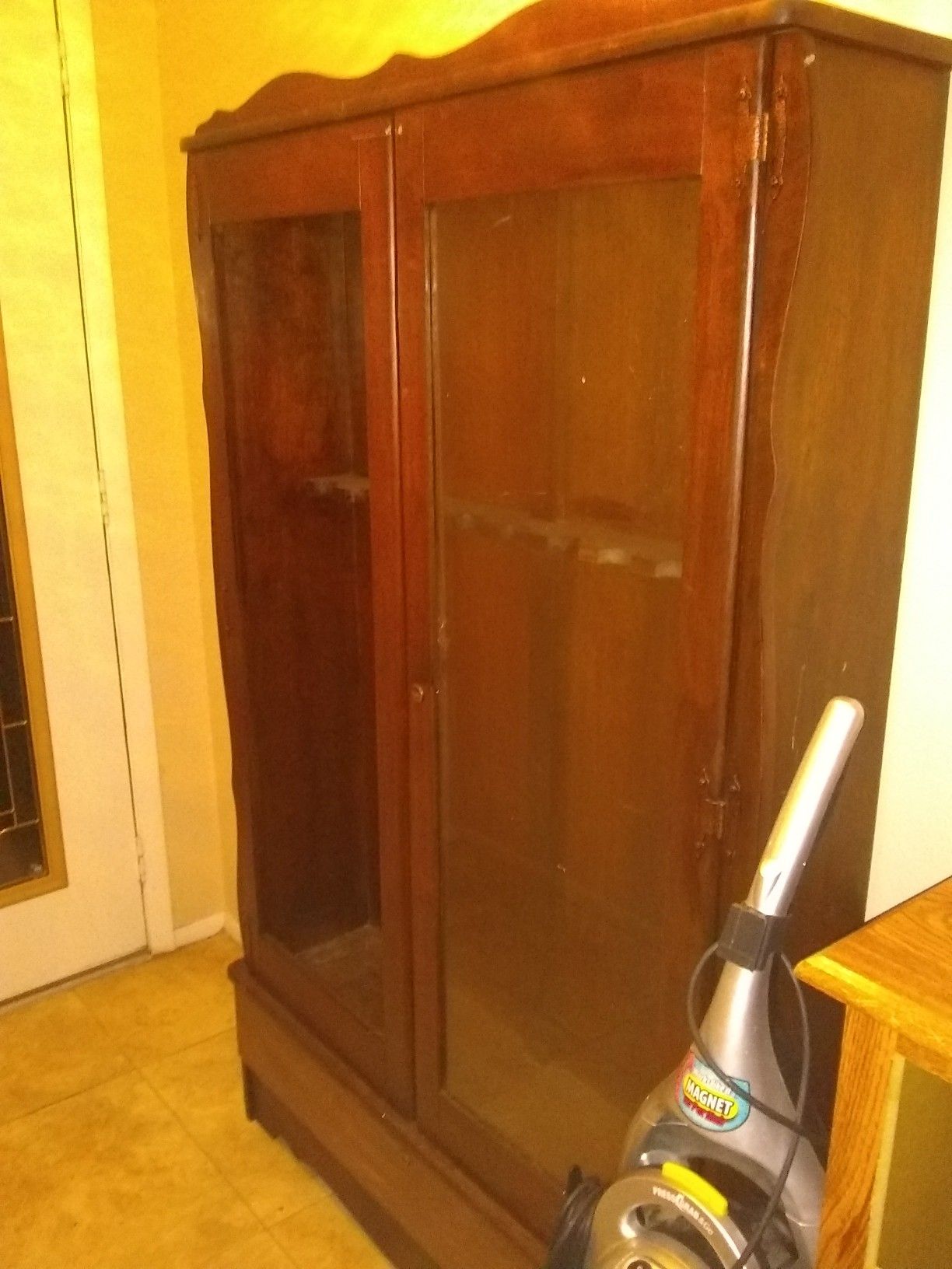 Antique gun cabinet