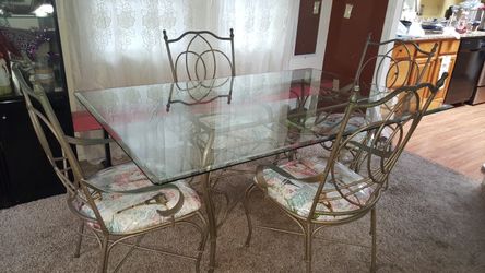 Glass dinning table 4 chairs