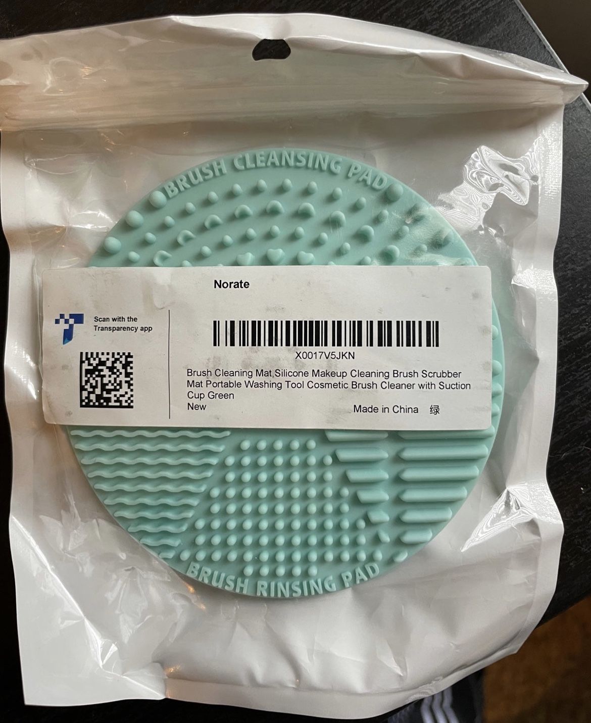 Makeup brush cleaning pad