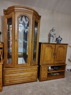 Beautiful 4 piece entertainment center like new free in spring hill