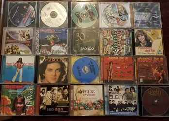 CD'S from different artists all of them Hispanic music