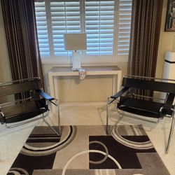 Pair Of Matteo Grassi Leather Chairs