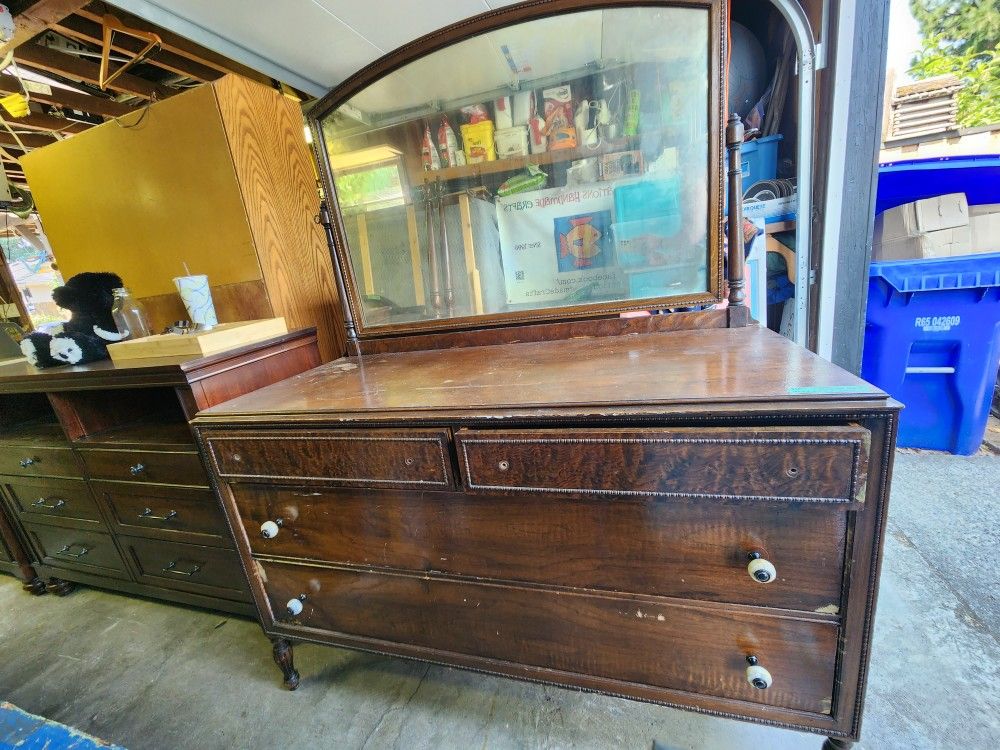Antique Dresser on peg legs
with tilt mirror by Holland Furniture Co.