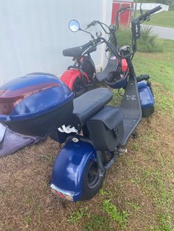 Two city coco electric scooters