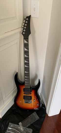 Electric Guitar, 6 strings, Sunset color, soft bag, strap, whammy bar, tool