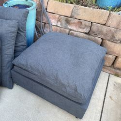 New large gray ottoman. 32” x 32” x 18” high.   Extra thick cushion, 