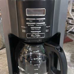 Mr. Coffee 12-Cup Programmable Coffee Maker featuring a Brushed Metallic finish and a digital display.