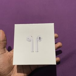 Apple AirPods (2nd Generation) with charging case