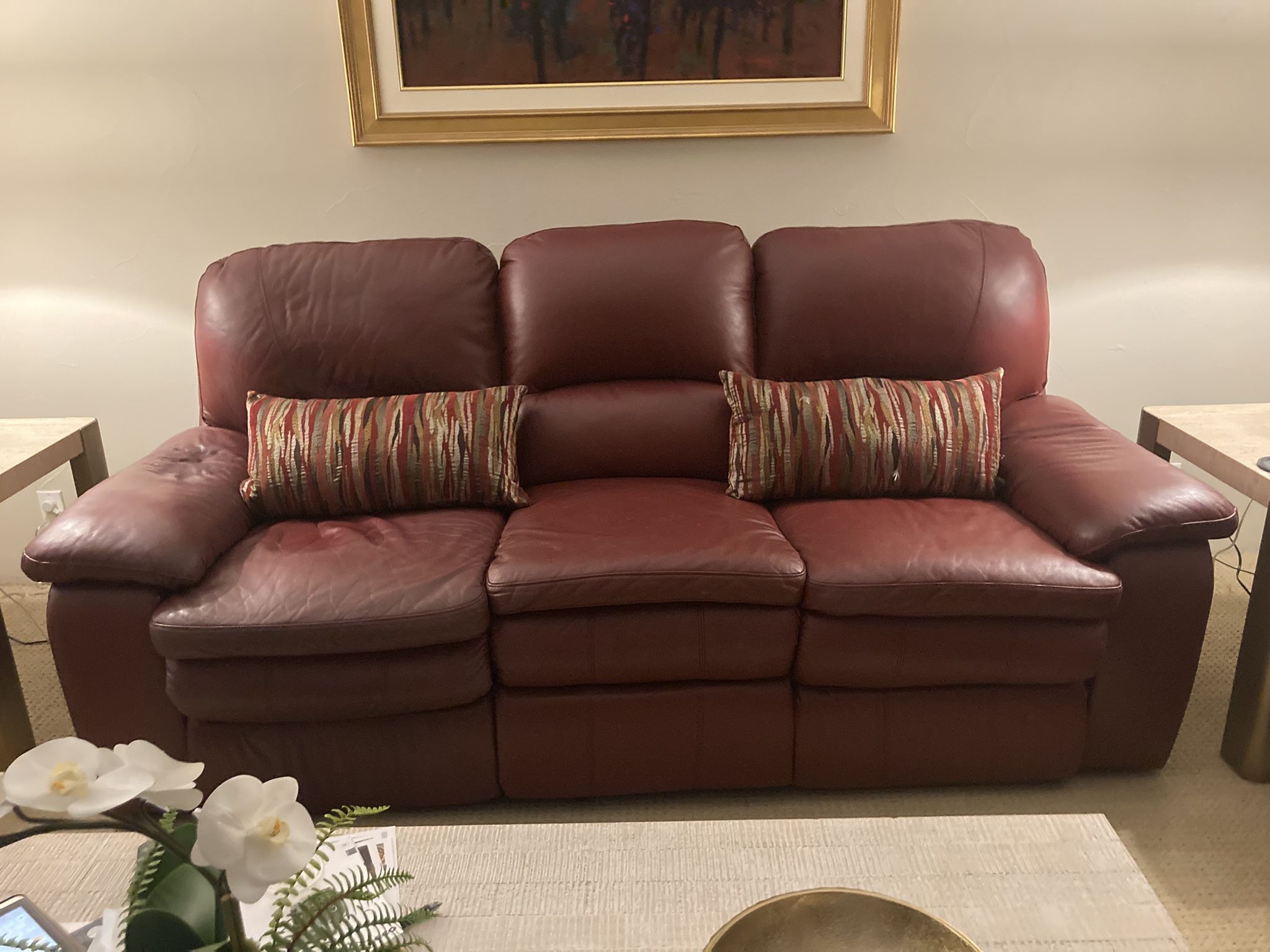 Beautiful Reddish Burgundy Leather Sofa with 2-Power Recliners. Also matching Loveseat for $100 more.