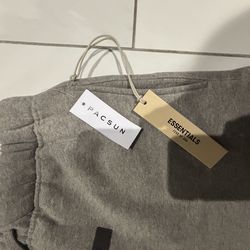 Essentials shorts dark oat size xs and sml