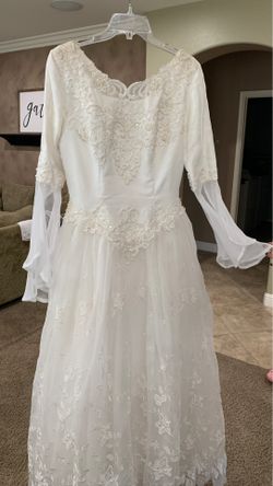 Wedding Dress No rips or tears but needs to be professionally cleaned