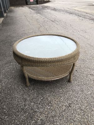 Photo 38” long 38” deep 21” tall Round Wicker Table With Glass Top And shelf underneath