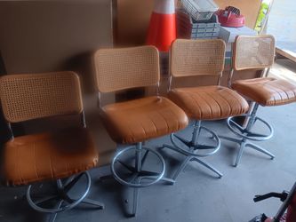 Selling 4 old school bar stools. Leather seats. Mesh back. In good condition. 1 needs a bolt to get to the same height as the other 3. Selling for $35