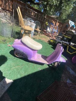Purple razor moped