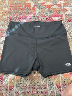 Two pairs of women’s plus size Northface bike shorts price is for both