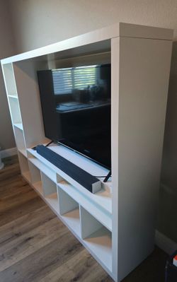 55" Vizio TV, Soundbar, and cabinet