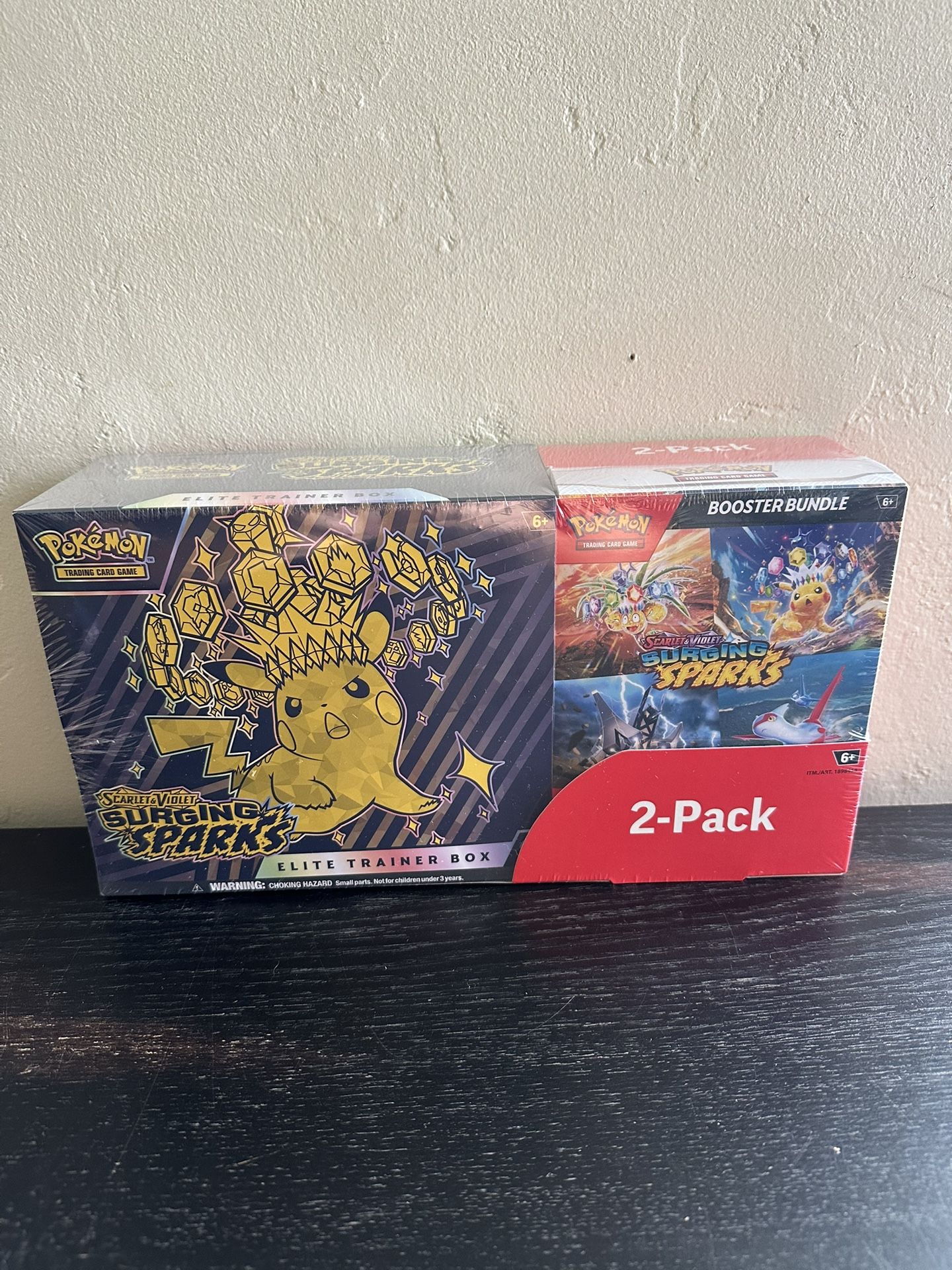 Surging Sparks Etb + Booster Bundle