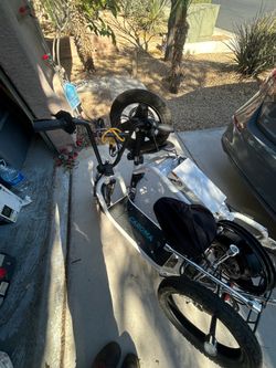 2 working Caroma Electric Scooter with seat