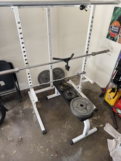 Gym Rack With Weights And 2 Barbells