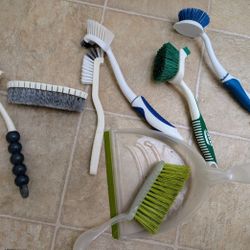 Lot of cleaning supplies (scrubbing brush, small dust pan, small sweep/broom, bathroom scrubber)