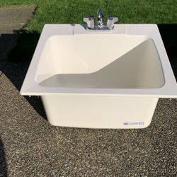 White Utility Sink. 