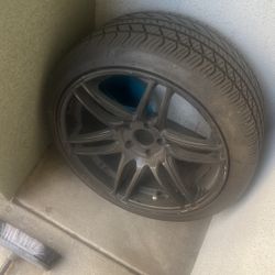 3 Black Rims With Tire