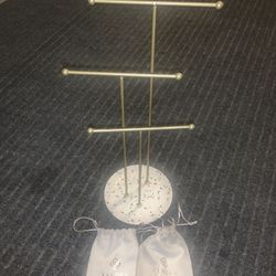 STAND HOLDER & KENDRA SCOTT STORAGE BAGS