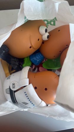 About 6-7 mr. Potato Heads