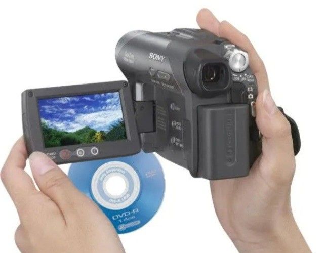Sony DCR-DVD205 Handycam Camcorder/Battery/Charging Cable & 4 DVD-RW Sealed Discs. Sony DCR-DVD205 Handycam camcorder. Key features and specifications
