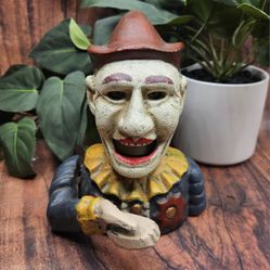 Vintage-Style Cast Iron Clown Mechanical piggy Bank-Unique Circus Decor, Humpty Dumpty red white blue This is a vintage-style cast iron clown mechanic