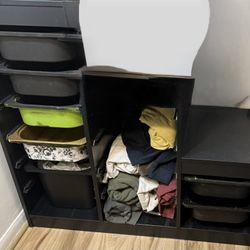 IKEA shelving unit with multiple pull-out bins.