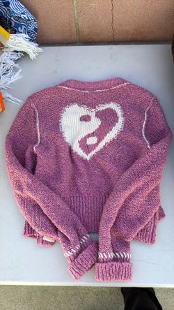 Pink sweater. Knitted