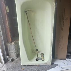 Used Vintage Green cast Iron Bath Tub