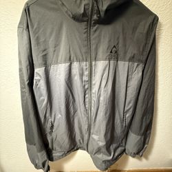 Gerry men's two-tone gray hooded lightweight windbreaker jacket with a full zip closure Large on tag