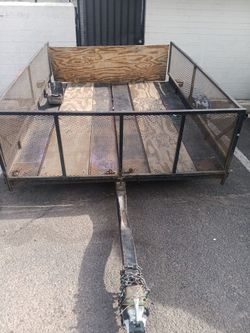 6X8 Trailer Sides come of and can be snapped back in as well as the back, piece above the tire needs to be welded back on , asking $1000 can carry up 