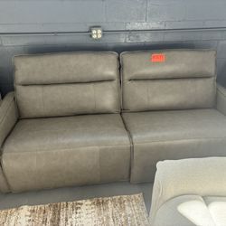 Leather Love seat power reclining 