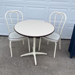 Small Table With Two Matching Chairs 30” Round Table That Is 29” High Color Off-white