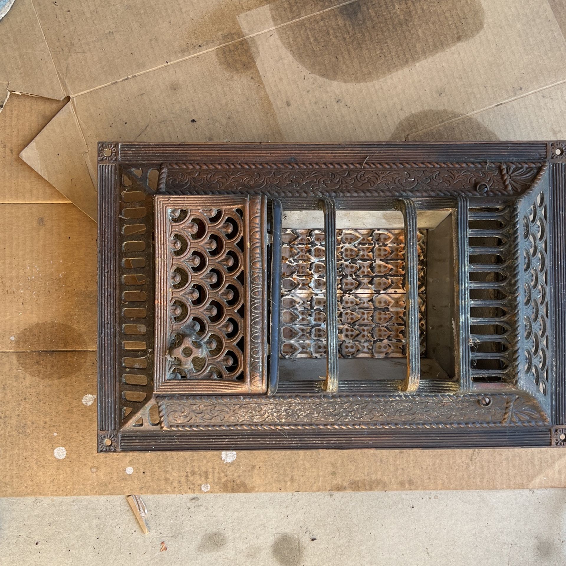 Spanish revival Copper heater Decorative face