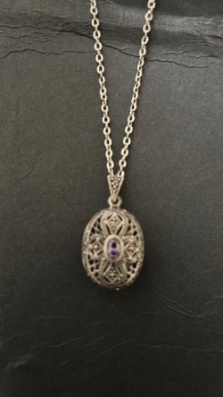 Marcasite & Silver Locket With Amythyest Stone In The Center. Chain Is 20” Long