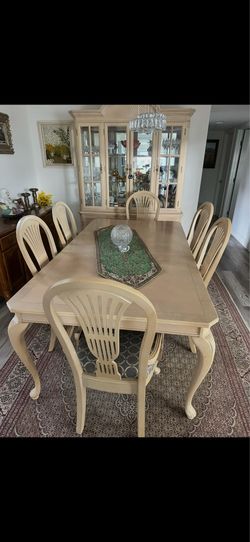 Dining set of 4 chairs and a table and china cabinet
