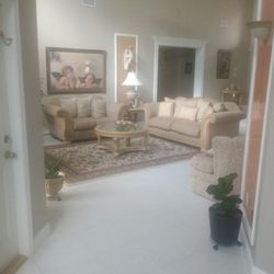 Loveseat And Sofa With One Or Two Possibly Three Tables