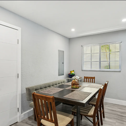 Dining room table with chairs and bench