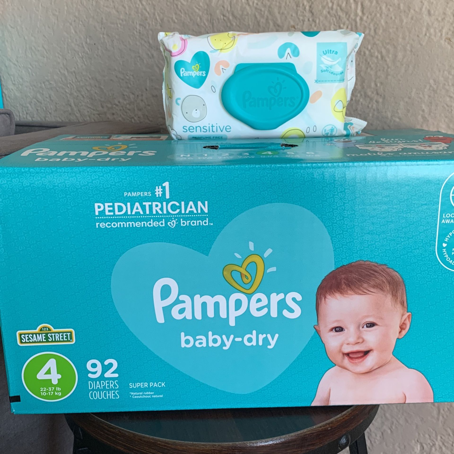 Pampers diapers & 1 Free Pack Of Wipes