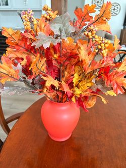 Fall flower arrangement in Orange glass face